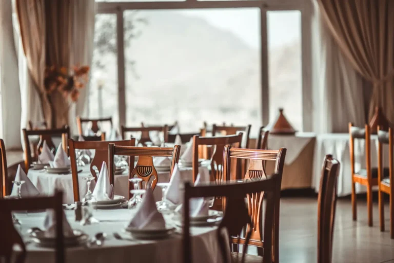 A dining room with tables ready for service